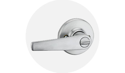 Kwikset Delta Collection Lever product isolated on top of a gray circle
